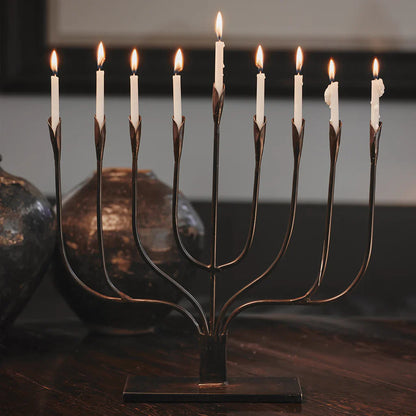 Jan Barboglio Menorah Iron petal candle holders on an iron rectangular base
